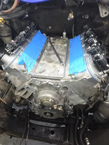 Engine bay with timing-chain components exposed